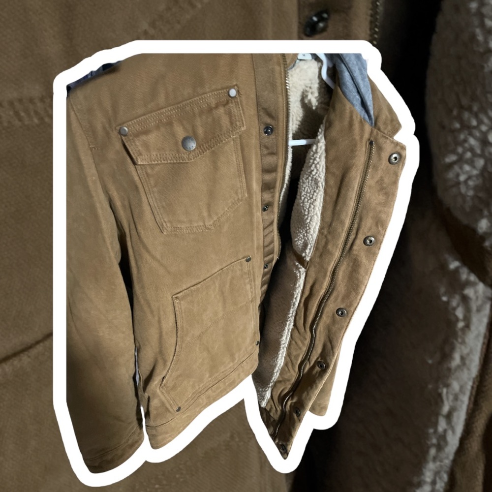Medium tan levi coat with cream fur interior
